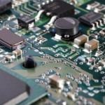 shallow depth-of-field image of green computer circuit board